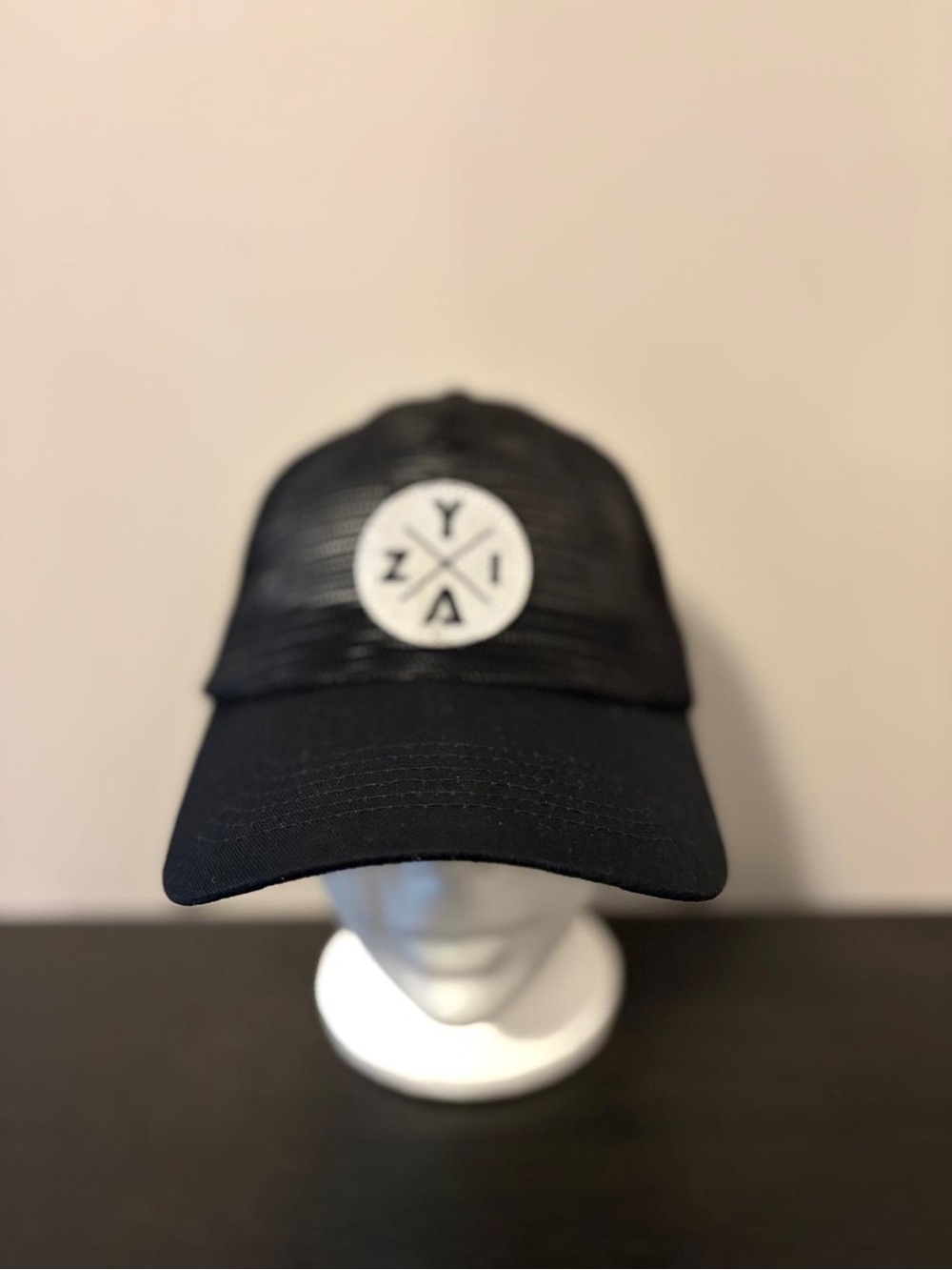 ZYIA Black Trucker Hat